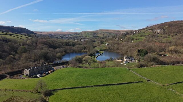 Aerial Drone view of Huddersfield narrow canal and Sparth Reservoir, Marsden, West Yorkshire 