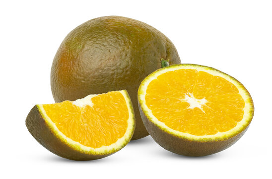 Chocolate orange citrus fruit and half of choco orange with slice of brown orange isolated.