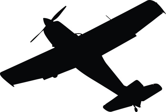 A black silhouette of an airplane flying through the air