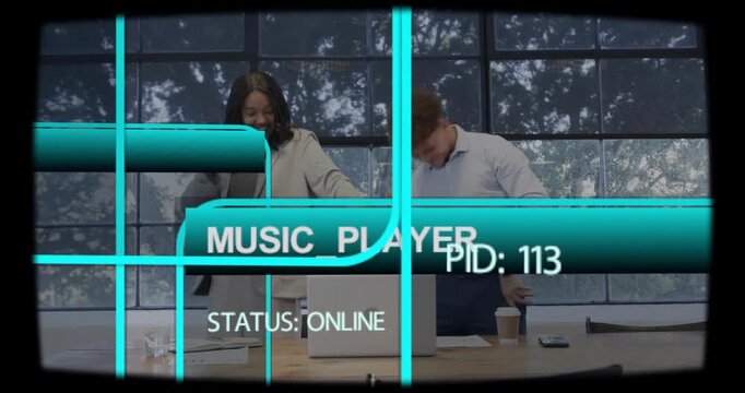 Diverse coworkers standing and dancing in conference room with laptop, papers, coffee, MUSIC_PLAYER