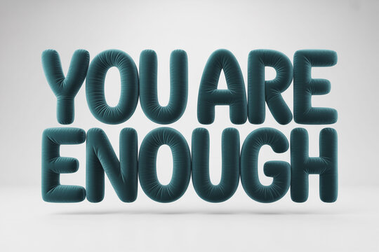 A motivational phrase 'You Are Enough' in large, 3D teal letters on a white background