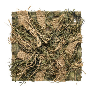 Military ghillie camouflage fabric swatch with burlap threads isolated