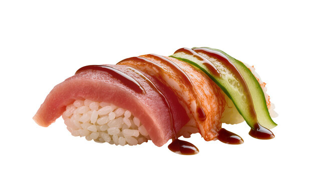 Isolated fresh trio of delicious Japanese nigiri sushi with tuna, crab, and cucumber drizzled in sauce