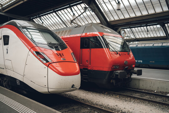 Zurich, Switzerland March 28, 2026: High speed and regional trains standing on tracks inside a covered train station