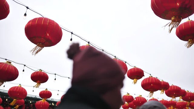 Red lanterns decorating for Chinese New Year celebration against a clear sky