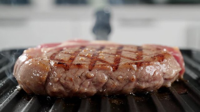 Sizzling Steak Grilling Perfection for a Delicious Meal.