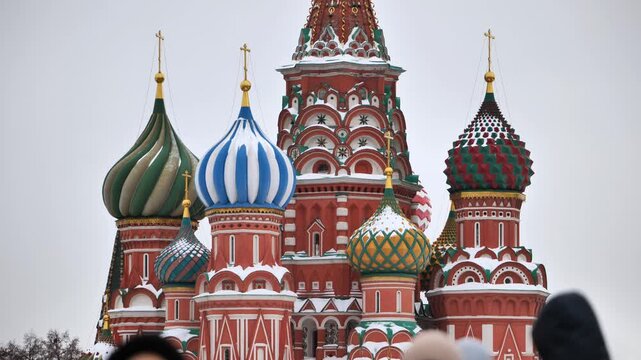 St. Basil's Cathedral onion domes covered in snow, Moscow, Russia, winter season