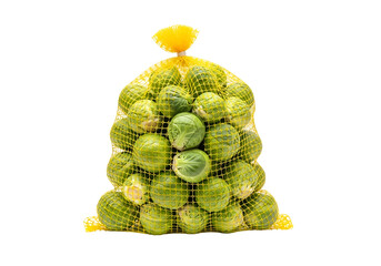 Fototapeta premium A vibrant display of fresh brussels sprouts nestled within a bright yellow mesh bag against a stark black background.