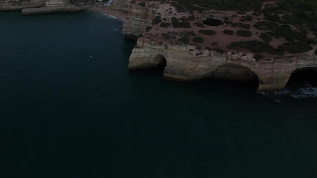 Cinematic Aerial View of Benagil Sea Caves and Algarve Coast, Portugal