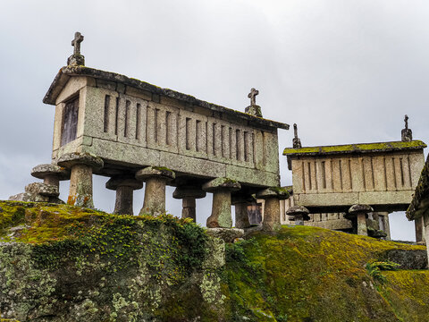 Granaries of Soajo or 'Espigueiros do Soajo' perched on stilts, on granite massif. They were built off the ground to protect food crops from rats and other rodents. Some are still used today. Portugal