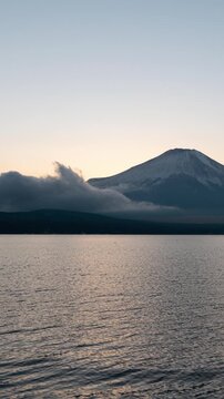 Mount Fuji Reflected in Lake Yamanaka at Dusk in Winter (Vertical/Time Lapse/PANNING)