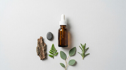 Fototapeta premium Natural ingredients for skincare and aromatherapy with dropper bottle with essential oil with alternative medicine with beauty products with amber bottle with flat lay