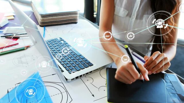 Designer typing laptop starting overlay icons, shifting tablet strokes, pencil marking blueprints