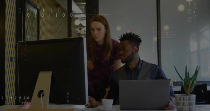 Woman leaning pointing, man turning laptop typing while reviewing code with overlays on screen