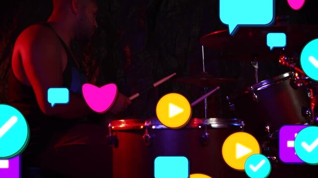 Playing adult male drummer in tank top striking snare and toms, notifications appearing, copy space