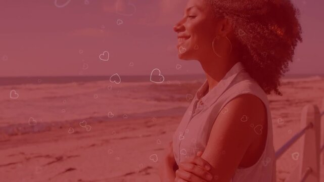 Woman on beach railing playback starting heart drifting across face turning smiling for marketing