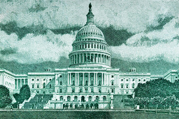The United States Capitol on the back of the fifty dollar bill. United States national currency banknote fragment with U. S. Capitol © Klochkov