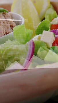 Vertical video: HUD appearing over salad bowl, nodes joining line to area to bars showing data
