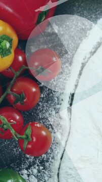 Vertical video: Camera panning down showing produce on flour, % overlays tagging for food testing