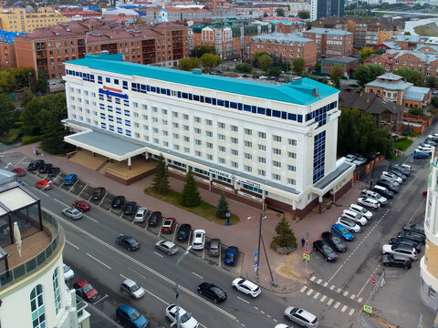 Tyumen, Russia - September 1, 2023: High-angle drone shot of the Neftyanik Hotel (translated as "Oil Worker" Hotel) located at 12 Chelyuskintsev Street in Tyumen, Russia, captured on September 1, 2023