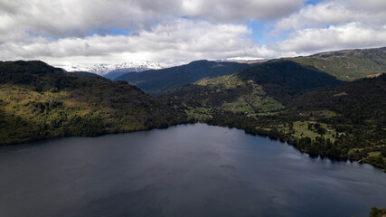 Obraz premium Aereal image of a lake on cloudy day