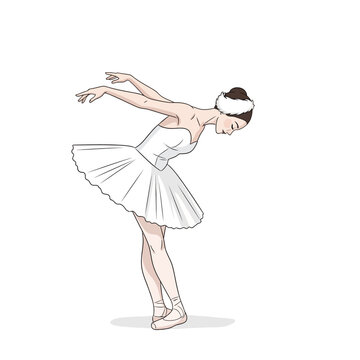 Elegant ballerina in a white tutu performing a graceful pose
