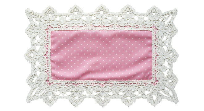 Pink fabric with white polka dots in a white lace doily isolated on transparent background
