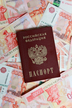 Russian Federation passport on 5000 ruble banknotes background