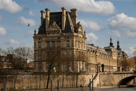 A view of the Flora Pavillion, the Louvre Museum, Paris taken from a boat on the river Seine.