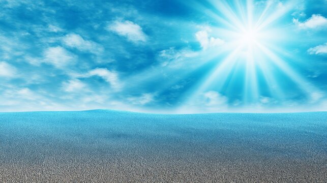 Bright sun shines over clear blue sky and calm sea on a sunny day at the beach