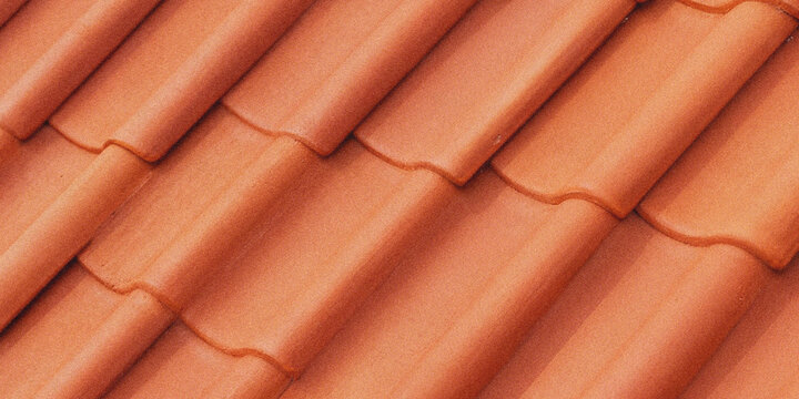 A close up of a red roof with a pixelated effect