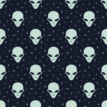 Small white alien heads and stars isolated on a dark black and blue background. Monochrome seamless pattern. Simple flat vector graphic illustration. Texture.