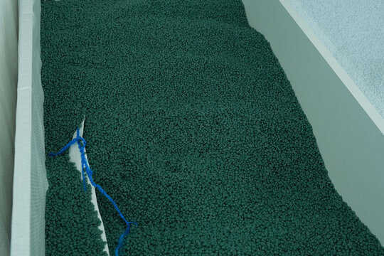 Secondary polypropylene granules. Recycled polymer made from post-consumer or post-industrial plastic waste. Zero waste. PP granules in big-bags inside container