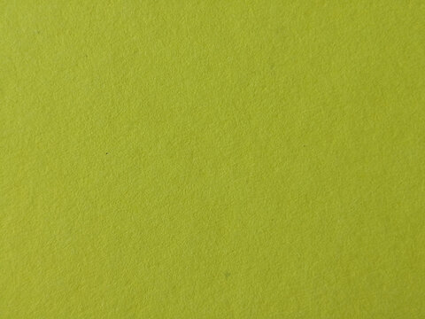 Textura de papel granulado en color verde pistacho con acabado mate