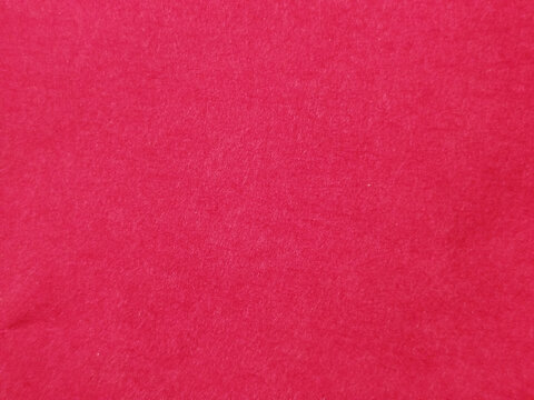 Textura de fieltro de color rosa fucsia con superficie suave y fibrosa para fondos de manualidades y dise&ntilde;o textil