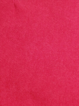 Textura de fieltro de color rosa fucsia con superficie suave y fibrosa para fondos de manualidades y dise&ntilde;o textil