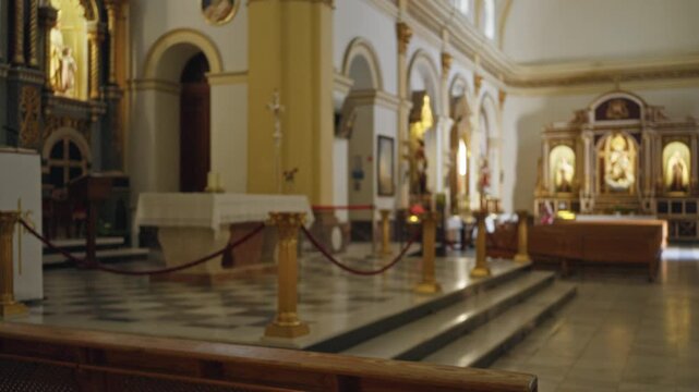 Blurred church interior with soft bokeh focus on altar and aisle; background copyspace template calm.