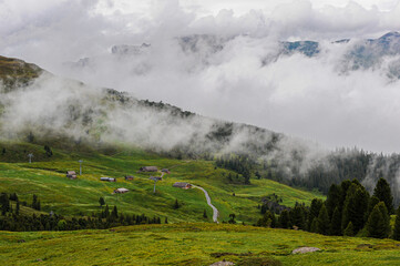 Fototapeta premium Dramatic clouds swirling around the Eiger North Face 