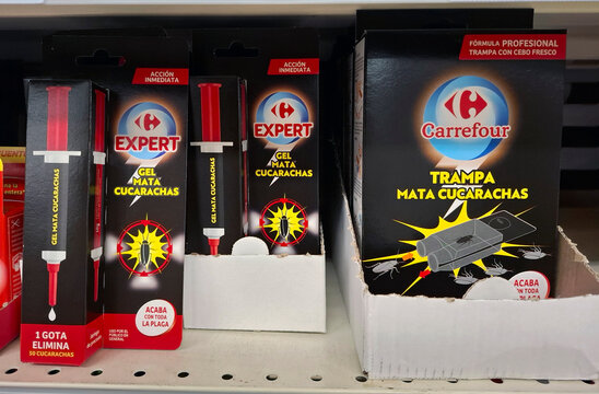 DENIA, SPAIN - December 10, 2025.Selection of Carrefour Expert and Carrefour cockroach killing gels and traps on shelves in supermarket in Spain