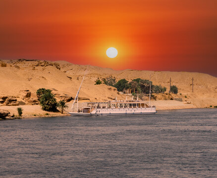 Sunset in the desert on the Nile, boat on the Nile Egypt