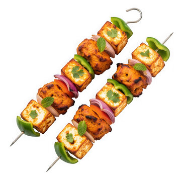 Paneer Tikka Skewers Grilled with Vegetables and Mint on Black Background Studio Shot