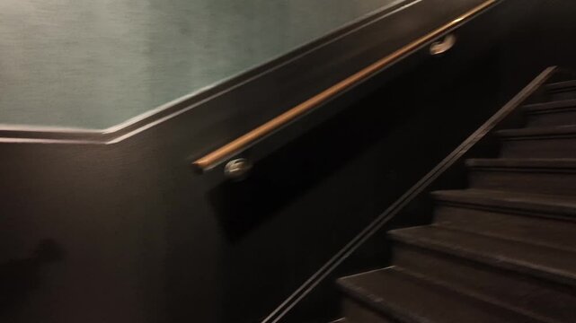 Walking up Stairs in a Luxury Building at Evening Time