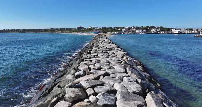 New Shoreham, RI, USA - August 8, 2026  Block Island, Rhode Island summer arial video of the breakwater barrier at Old Harbor.