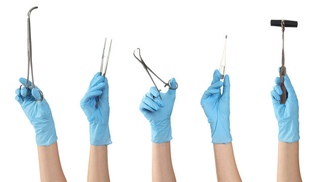 Medical instruments in hands against white background, set