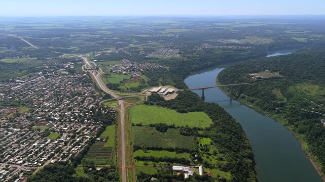 Drone shot captures Ponte Tancredo Neves linking Foz do Igua&ccedil;u Brazil to Puerto Iguaz&uacute; Argentina.