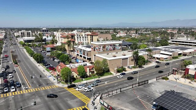 Downey, California, USA - Aerial View of Downtown Busy Streets and Hotels on Firestone Blvd on a Sunny Day