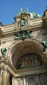 BERLIN, GERMANY - MARCH 13, 2026: Close-up view of the ornate facade and sculptures of Berlin Cathedral.