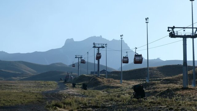 The cabins moving along the mountain cable car system offer spectacular views.