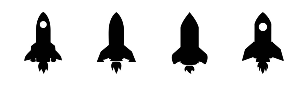 Four black silhouette rocket ship launch vector illustration for space exploration and travel concept