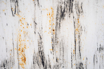 Fototapeta premium Grungy White Painted Metal Texture Background with Rust Spots and Scratches. Abstract Industrial Surface of Weathered Rusty Iron Plate, Close-up of Distressed Metallic Wall with Aging